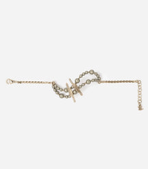 Bracelet en perles et motif barrettes doré